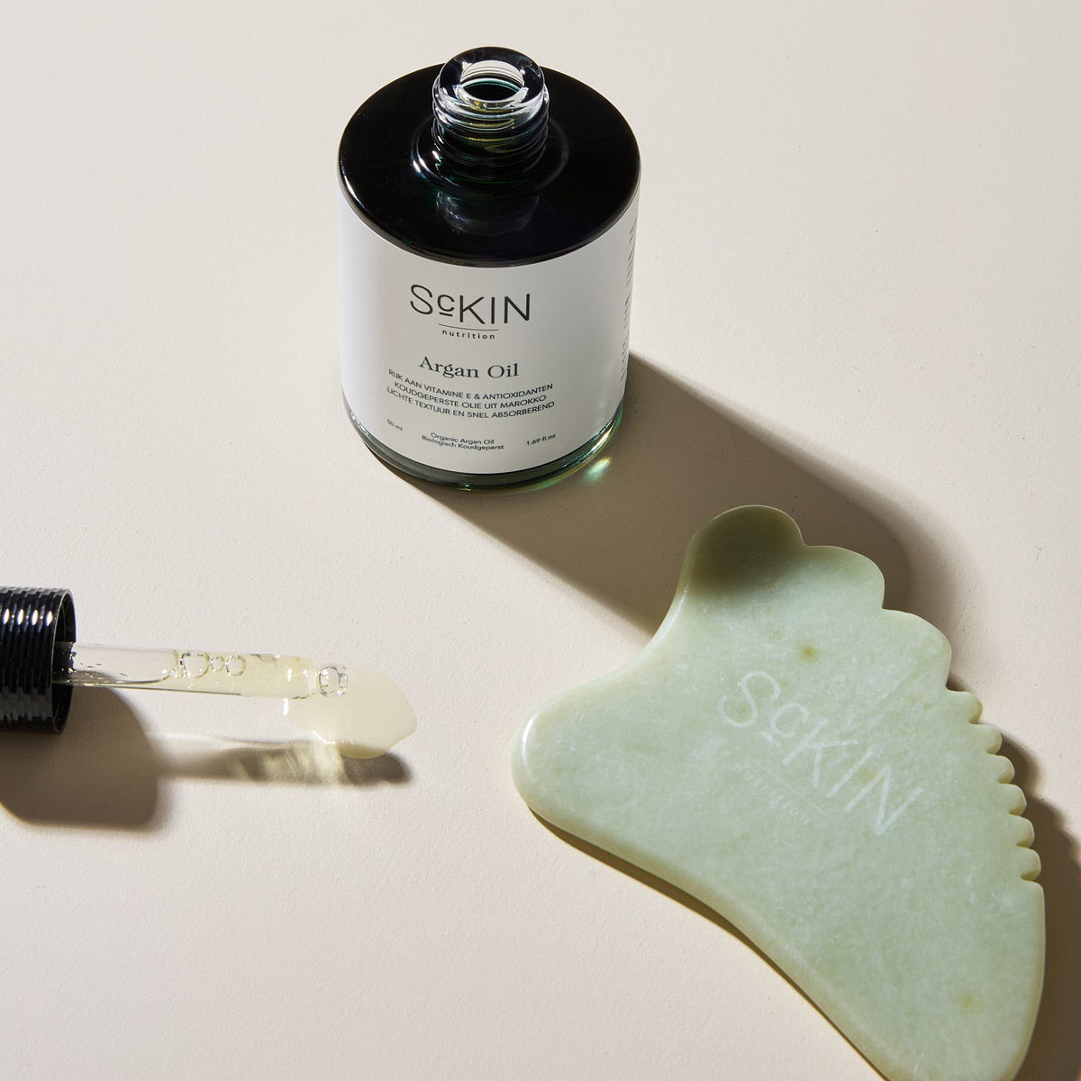 argan olie en jade guasha